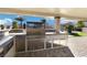 Stainless steel appliances and granite countertops highlight this expansive outdoor kitchen at 5448 Hestia Hills Ct, Las Vegas, NV 89149