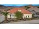 Luxury home with terracotta tile roof, offering scenic views at 894 Moonstone Dr, Boulder City, NV 89005