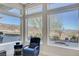 Relaxing sitting area with large windows offering stunning mountain views at 894 Moonstone Dr, Boulder City, NV 89005