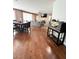 Bright dining room with hardwood floors and a view into the living room at 917 Old Creek Way, North Las Vegas, NV 89084