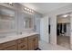 Elegant bathroom with double sinks and walk-in shower at 10122 Ashford Mill Ct, Las Vegas, NV 89178