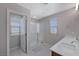Bathroom boasts double vanity, large shower, and window at 10122 Ashford Mill Ct, Las Vegas, NV 89178