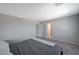 Comfortable bedroom with ensuite bathroom access at 10122 Ashford Mill Ct, Las Vegas, NV 89178