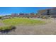 Community green space with grass, trees, and benches at 10122 Ashford Mill Ct, Las Vegas, NV 89178
