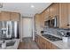 Kitchen boasts stainless steel appliances and a gas cooktop at 10122 Ashford Mill Ct, Las Vegas, NV 89178