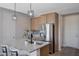 Modern kitchen with stainless steel appliances and granite countertops at 10122 Ashford Mill Ct, Las Vegas, NV 89178
