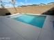 Inviting rectangular pool in a private backyard at 10122 Ashford Mill Ct, Las Vegas, NV 89178