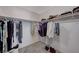 Large walk-in closet with ample hanging and shelving space at 10122 Ashford Mill Ct, Las Vegas, NV 89178