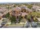 Impressive aerial view of a large home featuring a terracotta roof and well-manicured landscaping at 10923 Willow Heights Dr, Las Vegas, NV 89135