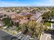 Stunning aerial shot of a home equipped with solar panels and beautifully landscaped grounds at 10923 Willow Heights Dr, Las Vegas, NV 89135