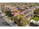 Luxury home with solar panels, a red tile roof, and meticulously maintained landscaping at 10923 Willow Heights Dr, Las Vegas, NV 89135