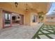 Back patio includes slate tiles and an outdoor kitchen at 10923 Willow Heights Dr, Las Vegas, NV 89135