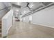 Spacious basement featuring high ceilings, exposed ductwork and concrete flooring at 10923 Willow Heights Dr, Las Vegas, NV 89135
