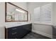 Bathroom with a vanity and shutters for enhanced privacy at 10923 Willow Heights Dr, Las Vegas, NV 89135