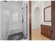 Walk-in shower features sleek marble tiling and a glass door at 10923 Willow Heights Dr, Las Vegas, NV 89135