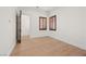 Bright bedroom with hardwood floors, wooden shutters, and ample natural light at 10923 Willow Heights Dr, Las Vegas, NV 89135