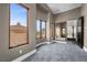 Large bedroom with ample natural light from large windows and a view of the surrounding area at 10923 Willow Heights Dr, Las Vegas, NV 89135