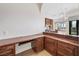 Spacious home office with custom cabinetry, drawers, and built-in desk space at 10923 Willow Heights Dr, Las Vegas, NV 89135