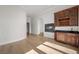 Open living area with custom bar area, fireplace, and ample natural light at 10923 Willow Heights Dr, Las Vegas, NV 89135