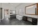 Sleek bathroom featuring a modern tub, dual vanities, and a spacious layout with designer finishes at 10923 Willow Heights Dr, Las Vegas, NV 89135