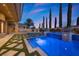 Picturesque backyard with a beautifully designed pool area, perfect for relaxing and enjoying the outdoors at 10923 Willow Heights Dr, Las Vegas, NV 89135