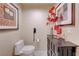 Elegant bathroom featuring decorative accents, a modern toilet, and neutral-toned walls, creating a serene and inviting space at 135 E Harmon Ave # 2721, Las Vegas, NV 89109