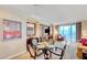 Stylish dining room with seating for four, elegant decor, and bright natural light at 135 E Harmon Ave # 2721, Las Vegas, NV 89109