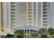 Modern high-rise building featuring sleek balconies and floor-to-ceiling windows for abundant natural light at 135 E Harmon Ave # 2721, Las Vegas, NV 89109
