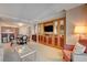 Spacious living room with dining area, built-in media center, and open layout at 135 E Harmon Ave # 2721, Las Vegas, NV 89109