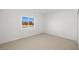 Bright bedroom with vinyl flooring and a window with natural light at 251 Glenoaks St, Pahrump, NV 89048