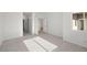 Spacious bedroom with light gray vinyl flooring and an open floor plan at 251 Glenoaks St, Pahrump, NV 89048