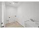 Laundry room with utility sink and space for washer and dryer at 251 Glenoaks St, Pahrump, NV 89048