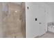 Modern bathroom features a luxurious glass enclosed shower with marble style tile at 2829 Forrest Duke Ct, Las Vegas, NV 89108