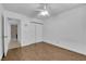 This bedroom has laminated wood floors and sliding closet doors at 2829 Forrest Duke Ct, Las Vegas, NV 89108