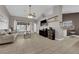 Spacious living room with vaulted ceilings, natural light, and tile flooring at 2829 Forrest Duke Ct, Las Vegas, NV 89108