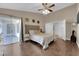 Airy main bedroom with sliding doors and a neutral color palette at 2829 Forrest Duke Ct, Las Vegas, NV 89108