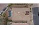 Aerial view of property with outdoor pool, spa, covered patio and desert landscaping at 36 Avenida Fiori, Henderson, NV 89011