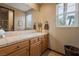 Bright bathroom features a single sink vanity, and tiled countertops at 36 Avenida Fiori, Henderson, NV 89011