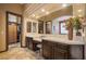 Spacious bathroom features dual sinks, tiled countertops, and a walk-in closet at 36 Avenida Fiori, Henderson, NV 89011