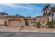 Charming single-story home featuring a desert landscape, tile roof, and inviting curb appeal at 36 Avenida Fiori, Henderson, NV 89011