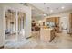 Gourmet kitchen with granite countertops, stainless steel appliances, and an island with seating at 36 Avenida Fiori, Henderson, NV 89011