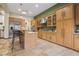 Well-equipped kitchen with custom cabinetry, granite countertops, and stainless steel appliances at 36 Avenida Fiori, Henderson, NV 89011