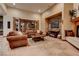 Spacious living room with hard surface floors, fireplace, and abundant natural light at 36 Avenida Fiori, Henderson, NV 89011