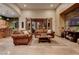 Bright, spacious living room with a beautiful tile floor, and large windows, perfect for entertaining at 36 Avenida Fiori, Henderson, NV 89011