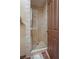 Tiled shower with a clear glass enclosure and modern fixtures, showcasing a clean and functional space at 36 Avenida Fiori, Henderson, NV 89011