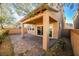 Covered patio in the backyard with brick pavers at 42 Navy Strauss St, Las Vegas, NV 89148