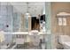 Modern bathroom with glass shower and marble vanity at 4381 W Flamingo Rd # 3309, Las Vegas, NV 89103