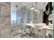 Modern bathroom with double vanity, large shower, and soaking tub at 4381 W Flamingo Rd # 3309, Las Vegas, NV 89103