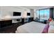 Bright bedroom, featuring a large bed and city views at 4381 W Flamingo Rd # 3309, Las Vegas, NV 89103