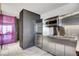 Modern kitchen with stainless steel appliances and breakfast bar at 4381 W Flamingo Rd # 3309, Las Vegas, NV 89103
